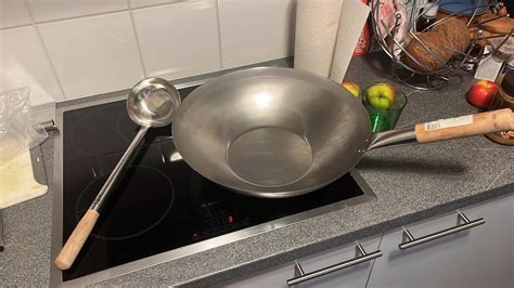 how to use a wok on a stove